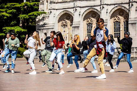 A group of students dancing together on Red Square